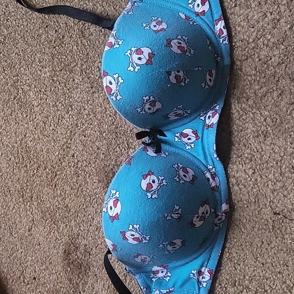 teal bra skulls print
